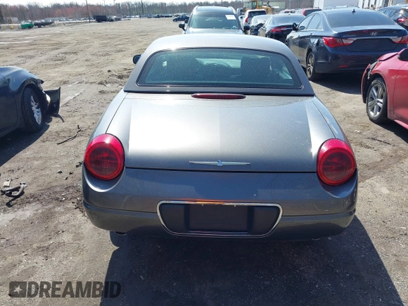 2003 Ford Thunderbird Deluxe z VIN 1FAHP60A23Y101899, wystawiony jako IAAI lot #41805269 z przebiegiem Nie podano mil oraz . Historia ofert i sprzedaży dostępna na DreamBid. Obrazek 16.