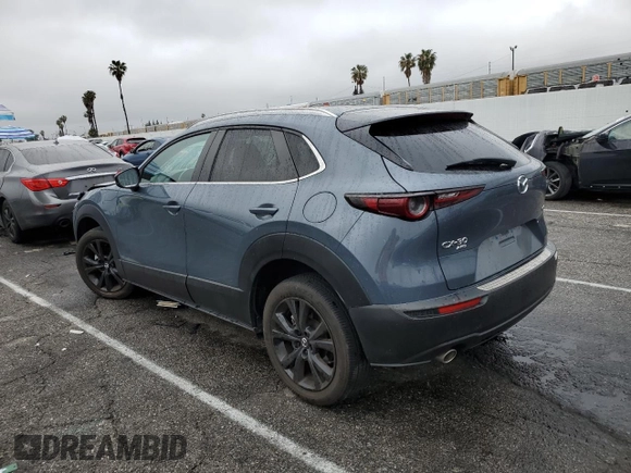 2023 Mazda CX-30 2.5 S Carbon Edition with VIN 3MVDMBCMXPM542809, listed as a Copart auction lot 51134315 with 21,279 mi miles and Salvage Title. Bid and sale history available at carsss.com. Image 2.