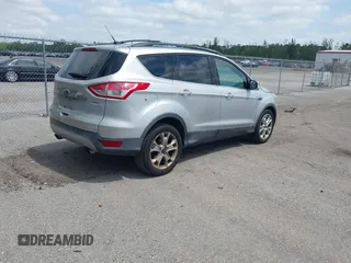 2013 Ford Escape SEL with VIN 1FMCU0H97DUD95194, listed as a IAAI auction lot 42052786 with 145,616 mi miles. Bid and sale history available at carsss.com. Image 4.
