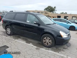 2012 Kia Sedona LX with VIN KNDMG4C78C6502141, listed as a IAAI auction lot 41725800 with 153,789 mi miles and . Bid and sale history available at carsss.com. Image 1.