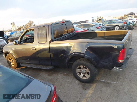 1999 Ford F-150 XL with VIN 1FTRX17L3XKB32547, listed as a IAAI auction lot 41331882 with Not Provided miles. Bid and sale history available at carsss.com. Image 14.