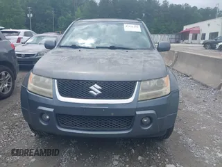 2006 Suzuki Grand Vitara Luxury z VIN JS3TE947464102818, wystawiony jako IAAI lot #42271219 z przebiegiem 192 714 mil mil oraz . Historia ofert i sprzedaży dostępna na DreamBid. Obrazek 6.
