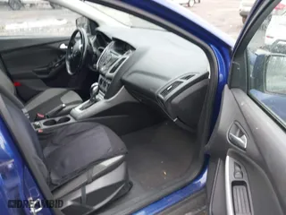 2012 Ford Focus SE with VIN 1FAHP3K23CL445128, listed as a IAAI auction lot 42019834 with 201,371 mi miles. Bid and sale history available at carsss.com. Image 5.