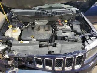 2014 Jeep Compass Sport with VIN 1C4NJDBB0ED598518, listed as a Copart auction lot 55072665 with 128,141 mi miles and Salvage Title. Bid and sale history available at carsss.com. Image 12.