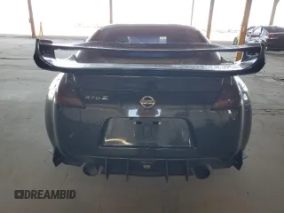 2009 Nissan 370Z z VIN JN1AZ44E19M411715, wystawiony jako Copart lot #56654815 z przebiegiem 123 791 mil mil oraz Szkoda całkowita • Salvage title. Historia ofert i sprzedaży dostępna na DreamBid. Obrazek 6.