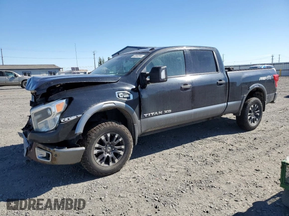 2017 Nissan Titan Pro-4X z VIN 1N6BA1F42HN530830, wystawiony jako Copart lot #63860384 z przebiegiem 317 812 mil mil oraz Szkoda całkowita • Salvage title. Historia ofert i sprzedaży dostępna na DreamBid. Obrazek 1.