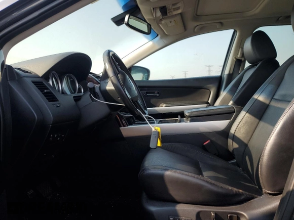 2014 Mazda CX-9 Grand Touring with VIN JM3TB3DVXE0443852, listed as a Copart auction lot 59106525 with 101,969 mi miles and Salvage title. Bid and sale history available at DreamBid. Image 7.