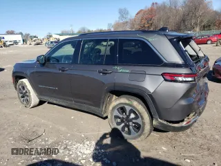2023 Jeep Grand Cherokee 30th Anniversary z VIN 1C4RJYB64P8769262, wystawiony jako Copart lot #84694194 z przebiegiem 25 239 mil mil oraz Szkoda całkowita • Salvage title. Historia ofert i sprzedaży dostępna na DreamBid. Obrazek 2.