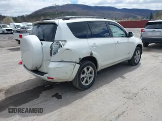 2010 Toyota RAV4 Limited with VIN JTMDF4DV3A5023063, listed as a IAAI auction lot 41983738 with 163,059 mi miles and . Bid and sale history available at DreamBid. Image 4.