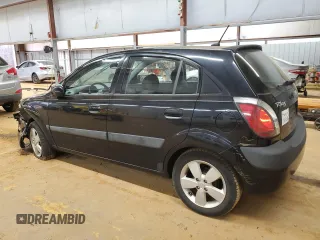 2009 Kia Rio LX with VIN KNADE243896580883, listed as a Copart auction lot 43735505 with 135,726 mi miles and Salvage Title. Bid and sale history available at carsss.com. Image 2.