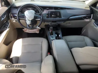 2020 Cadillac XT4 FWD Luxury z VIN 1GYAZAR40LF059910, wystawiony jako Copart lot #55426065 z przebiegiem 36 590 mil mil oraz Szkody całkowita. Historia ofert i sprzedaży dostępna na DreamBid. Obrazek 8.