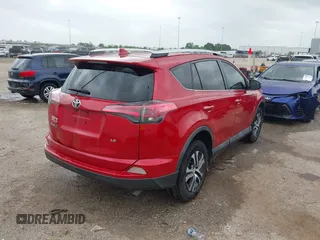 2016 Toyota RAV4 LE with VIN 2T3ZFREV4GW252399, listed as a IAAI auction lot 41955913 with 159,830 mi miles and . Bid and sale history available at carsss.com. Image 4.
