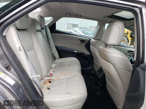 2014 Toyota Avalon Limited z VIN 4T1BD1EB4EU030790, wystawiony jako Copart lot #55202195 z przebiegiem 143 222 mil mil oraz Czysty tytuł • Clean title. Historia ofert i sprzedaży dostępna na DreamBid. Obrazek 10.
