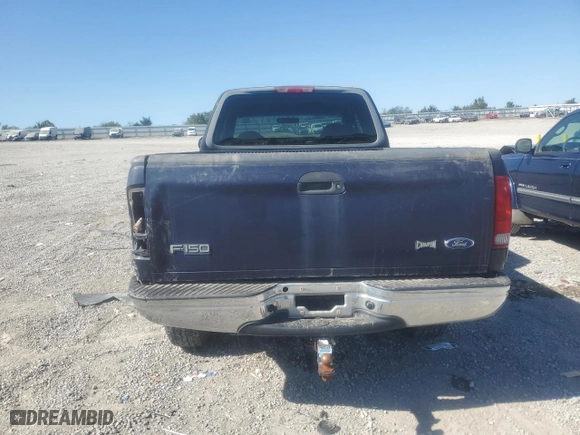 1999 Ford F-150 Work Series with VIN 1FTRX18W9XNA74452, listed as a Copart auction lot 75307294 with 152,631 mi miles and Salvage Title. Bid and sale history available at carsss.com. Image 6.