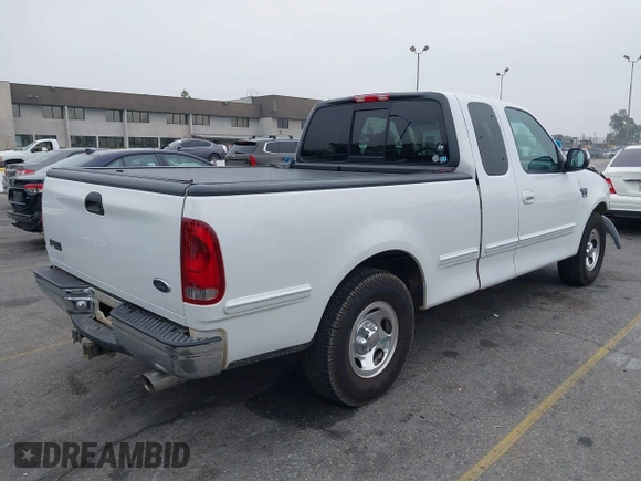2000 Ford F-150 XL with VIN 1FTRX17L4YNA39407, listed as a IAAI auction lot 42141350 with 82,824 mi miles and . Bid and sale history available at DreamBid. Image 4.