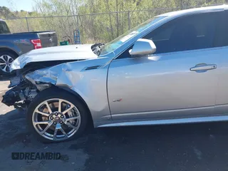 2009 Cadillac CTS-V z VIN 1G6DN57P090167350, wystawiony jako IAAI lot #41820827 z przebiegiem 210 266 mil mil oraz . Historia ofert i sprzedaży dostępna na DreamBid. Obrazek 18.