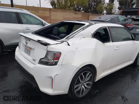 2014 Scion tC z VIN JTKJF5C77E3080128, wystawiony jako IAAI lot #42174898 z przebiegiem Nie podano mil oraz . Historia ofert i sprzedaży dostępna na DreamBid. Obrazek 11.