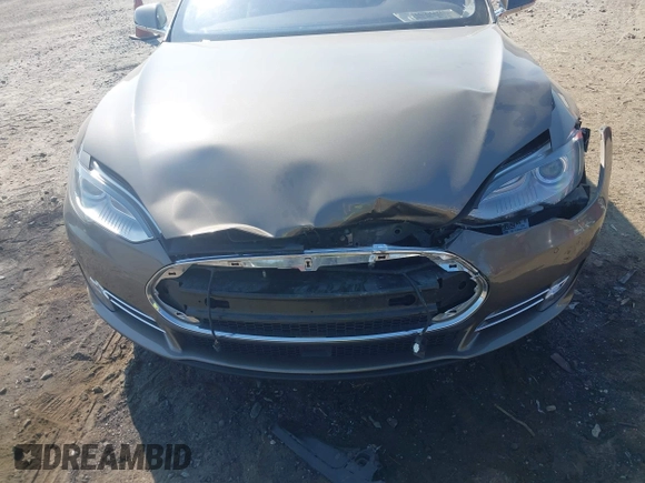 2016 Tesla Model S 70 with VIN 5YJSA1E1XGF126620, listed as a IAAI auction lot 40227035 with 71,400 mi miles and . Bid and sale history available at DreamBid. Image 6.