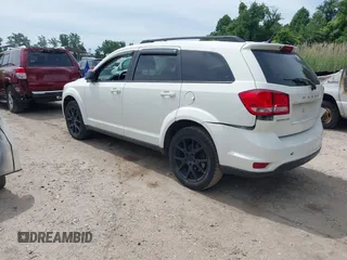 2014 Dodge Journey SXT z VIN 3C4PDCBBXET135001, wystawiony jako IAAI lot #42318360 z przebiegiem 152 321 mil mil oraz . Historia ofert i sprzedaży dostępna na DreamBid. Obrazek 3.