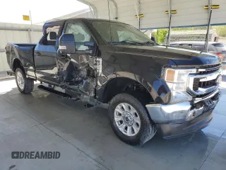 2022 Ford Super Duty F-250 SRW XL with VIN 1FT7W2BT7NEF85573, listed as a Copart auction lot 52827395 with 84,165 mi miles and Clean Title. Bid and sale history available at carsss.com. Image 4.