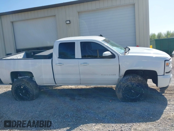 2016 Chevrolet Silverado 1500 LT with VIN 1GCVKREC4GZ106299, listed as a IAAI auction lot 41984118 with 181,626 mi miles and . Bid and sale history available at DreamBid. Image 13.