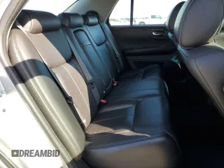 2010 Cadillac DTS 1SA z VIN 1G6KA5EY4AU126988, wystawiony jako Copart lot #49551415 z przebiegiem 114 768 mil mil oraz Tytuł czysty. Historia ofert i sprzedaży dostępna na DreamBid. Obrazek 10.