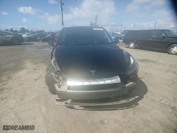 2022 Tesla Model Y Long Range with VIN 7SAYGDEE0NF551406, listed as a Copart auction lot 45467165 with 34,905 mi miles and Salvage Title. Bid and sale history available at carsss.com. Image 12.