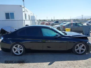 2015 BMW 3 Series 320i with VIN WBA3B1C57FK138441, listed as a IAAI auction lot 42034649 with Not Provided miles. Bid and sale history available at carsss.com. Image 12.