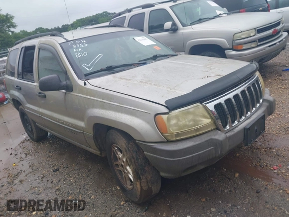 2003 Jeep Grand Cherokee Laredo z VIN 1J4GW48S33C599693, wystawiony jako IAAI lot #42228885 z przebiegiem 257 551 mil mil oraz . Historia ofert i sprzedaży dostępna na DreamBid. Obrazek 1.