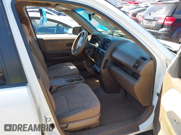 2002 Honda CR-V LX with VIN SHSRD68482U002257, listed as a IAAI auction lot 41644489 with 290,000 mi miles and . Bid and sale history available at carsss.com. Image 5.