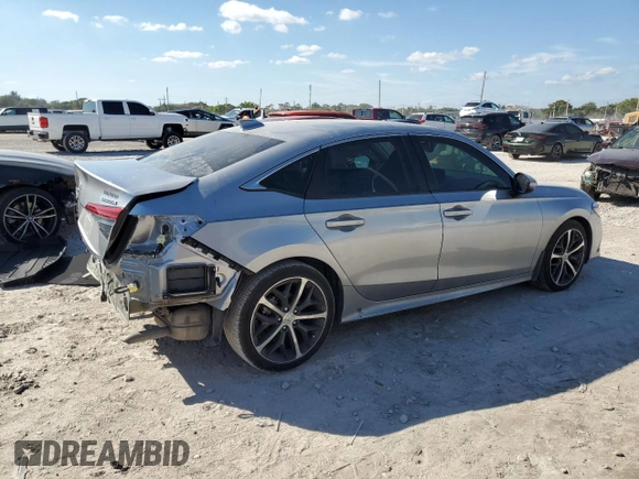 2024 Honda Civic Sedan Touring with VIN 2HGFE1F91RH328206, listed as a Copart auction lot 46074185 with 6,946 mi miles and Salvage Title. Bid and sale history available at carsss.com. Image 3.