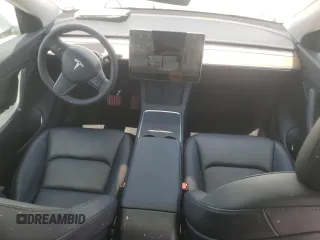 2022 Tesla Model Y Long Range z VIN 7SAYGDEE9NF455614, wystawiony jako Copart lot #57612985 z przebiegiem 22 101 mil mil oraz Szkoda całkowita • Salvage title. Historia ofert i sprzedaży dostępna na DreamBid. Obrazek 8.