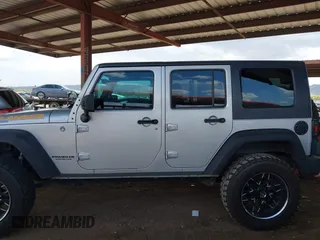2010 Jeep Wrangler Unlimited Sport with VIN 1J4BA3H18AL161243, listed as a IAAI auction lot 41960370 with 89,004 mi miles. Bid and sale history available at carsss.com. Image 14.