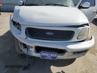 1997 Ford F-150 с VIN 1FTDF18W8VKC62309, выставлен на аукционе Copart как лот 48137745 с пробегом 156 917 миль миль и Списание • Salvage title. История ставок и продаж доступна на DreamBid. Изображение 12.