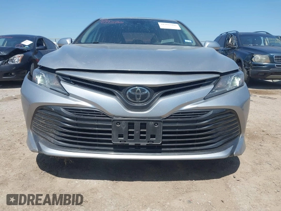2019 Toyota Camry LE z VIN 4T1B11HK8KU789295, wystawiony jako IAAI lot #41993966 z przebiegiem 94 165 mil mil oraz . Historia ofert i sprzedaży dostępna na DreamBid. Obrazek 12.
