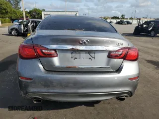 2015 Infiniti Q70 z VIN JN1BY1AP1FM541792, wystawiony jako Copart lot #86699094 z przebiegiem Nie podano mil oraz Szkoda całkowita • Salvage title. Historia ofert i sprzedaży dostępna na DreamBid. Obrazek 6.