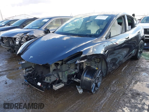 2024 Tesla Model Y Long Range with VIN 7SAYGDEE0RA300064, listed as a IAAI auction lot 41640541 with 5,049 mi miles and . Bid and sale history available at DreamBid. Image 20.