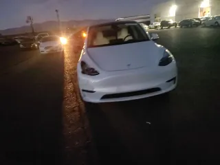 2023 Tesla Model Y Long Range with VIN 7SAYGDEE5PF867869, listed as a Copart auction lot 85119634 with 20,994 mi miles and Salvage Title. Bid and sale history available at carsss.com. Image 11.