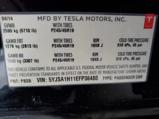 2014 Tesla Model S 60 z VIN 5YJSA1H11EFP36480, wystawiony jako Copart lot #71210254 z przebiegiem 121 014 mil mil oraz Szkoda całkowita • Salvage title. Historia ofert i sprzedaży dostępna na DreamBid. Obrazek 15.