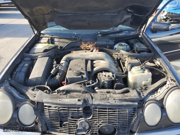 1996 Mercedes-Benz E Class with VIN WDBJF20F9TJ023003, listed as a Copart auction lot 86356784 with 230,944 mi miles and Salvage Title. Bid and sale history available at carsss.com. Image 11.