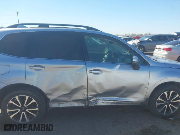 2017 Subaru Forester Touring with VIN JF2SJGTC9HH409665, listed as a IAAI auction lot 41749546 with 118,635 mi miles. Bid and sale history available at carsss.com. Image 13.