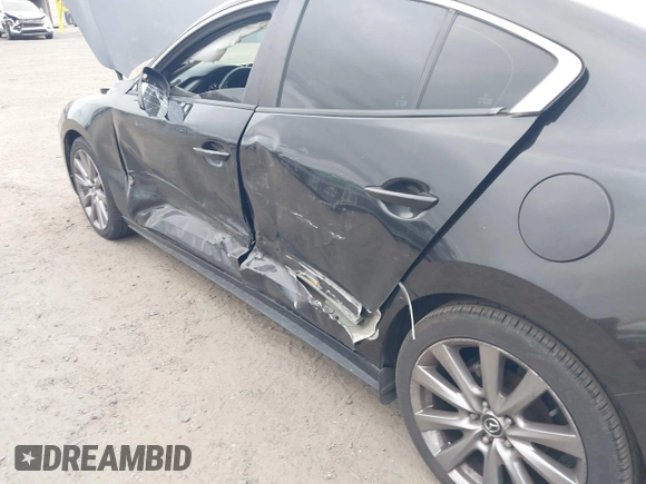2019 Mazda 3 w/Select with VIN 3MZBPAAL4KM108590, listed as a IAAI auction lot 41726873 with 90,257 mi miles and . Bid and sale history available at carsss.com. Image 6.