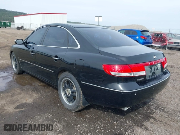 2007 Hyundai Azera SE with VIN KMHFC46F67A186034, listed as a IAAI auction lot 39181735 with 128,930 mi miles. Bid and sale history available at carsss.com. Image 3.