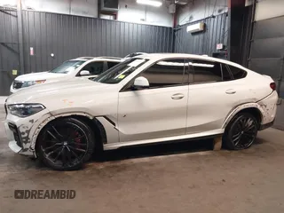 2022 BMW X6 M50i z VIN 5UXCY8C05N9J18577, wystawiony jako IAAI lot #41982042 z przebiegiem 64 155 mil mil oraz . Historia ofert i sprzedaży dostępna na DreamBid. Obrazek 14.