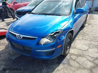 2012 Hyundai Elantra Touring GLS with VIN KMHDB8AE5CU134449, listed as a IAAI auction lot 41535397 with 214,247 mi miles. Bid and sale history available at carsss.com. Image 6.