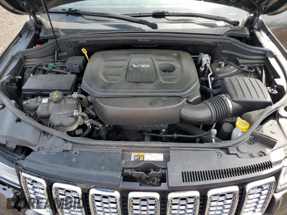 2017 Jeep Grand Cherokee Overland z VIN 1C4RJFCG2HC913434, wystawiony jako Copart lot #56580955 z przebiegiem 86 358 mil mil oraz Szkoda całkowita • Salvage title. Historia ofert i sprzedaży dostępna na DreamBid. Obrazek 12.