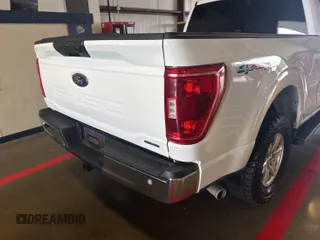 2021 Ford F-150 XL with VIN 1FTFX1E51MKF07502, listed as a IAAI auction lot 42737762 with 90,272 mi miles and . Bid and sale history available at DreamBid. Image 21.
