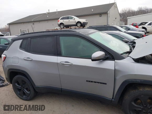 2020 Jeep Compass Latitude with VIN 3C4NJDBB5LT229144, listed as a IAAI auction lot 41448885 with 53,534 mi miles and . Bid and sale history available at DreamBid. Image 13.