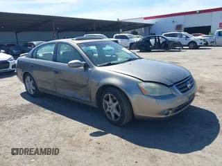 2003 Nissan Altima SE z VIN 1N4BL11E33C248493, wystawiony jako IAAI lot #41885780 z przebiegiem 190 802 mil mil oraz . Historia ofert i sprzedaży dostępna na DreamBid. Obrazek 1.
