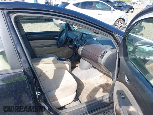 2005 Toyota Prius z VIN JTDKB20U450126080, wystawiony jako IAAI lot #42215698 z przebiegiem Nie podano mil oraz . Historia ofert i sprzedaży dostępna na DreamBid. Obrazek 5.